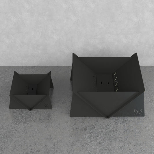 Small Fire Pit next to the larger Fire Pit XL, showing the size difference between Pretzel Designs fire pit models