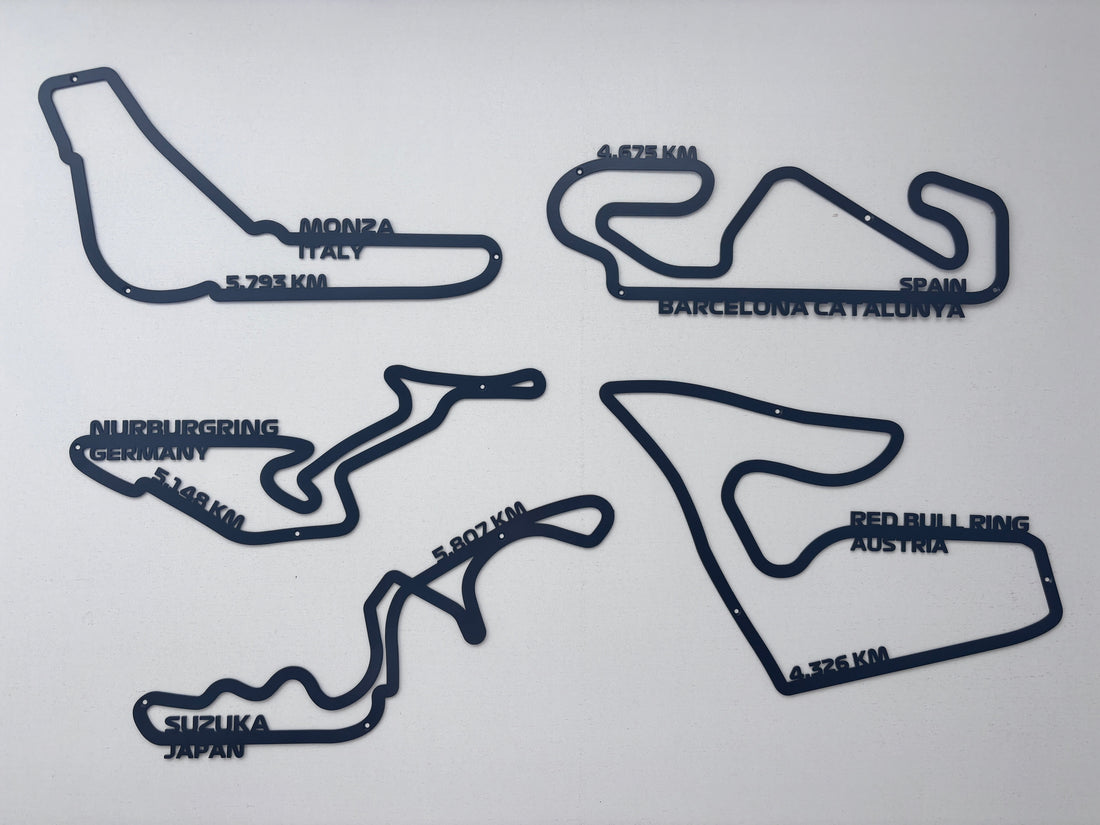 Custom laser-cut steel wall art of F1 circuits including Monza and Suzuka